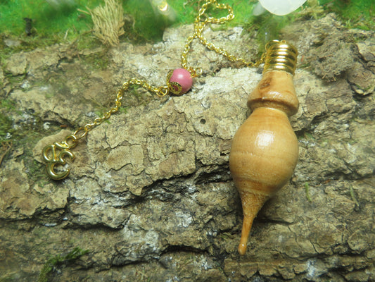 PENDULE EN BOIS TOURNÉ